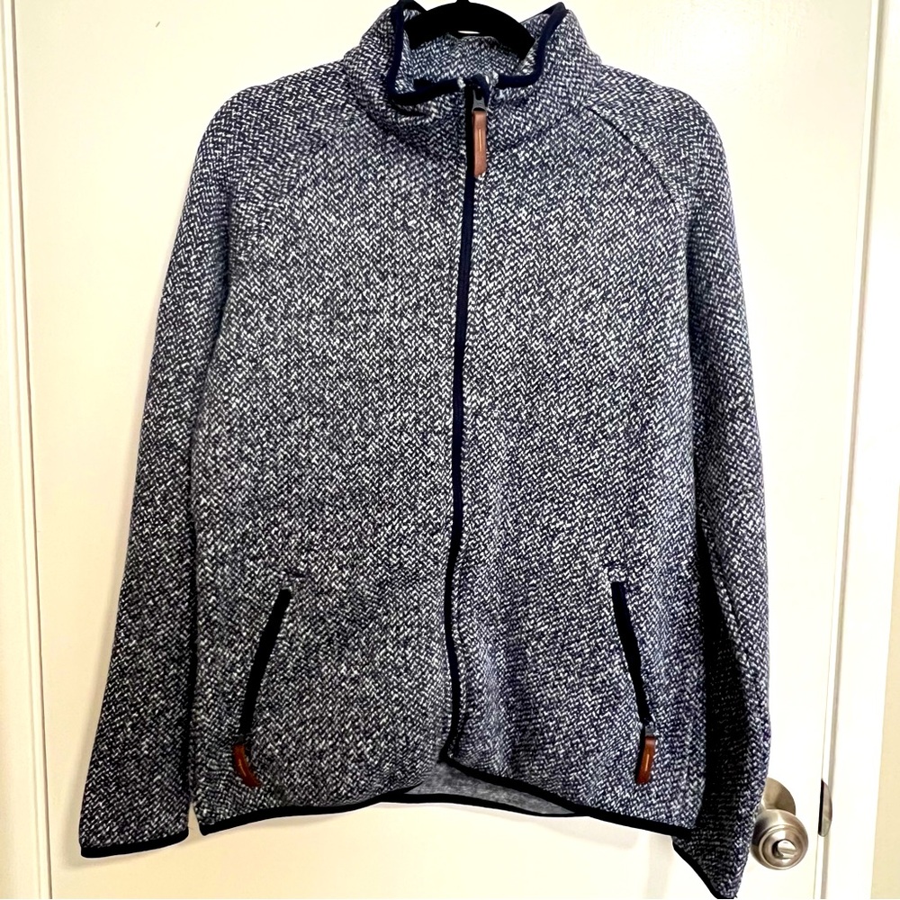 Like New zip up sweater. Used once.